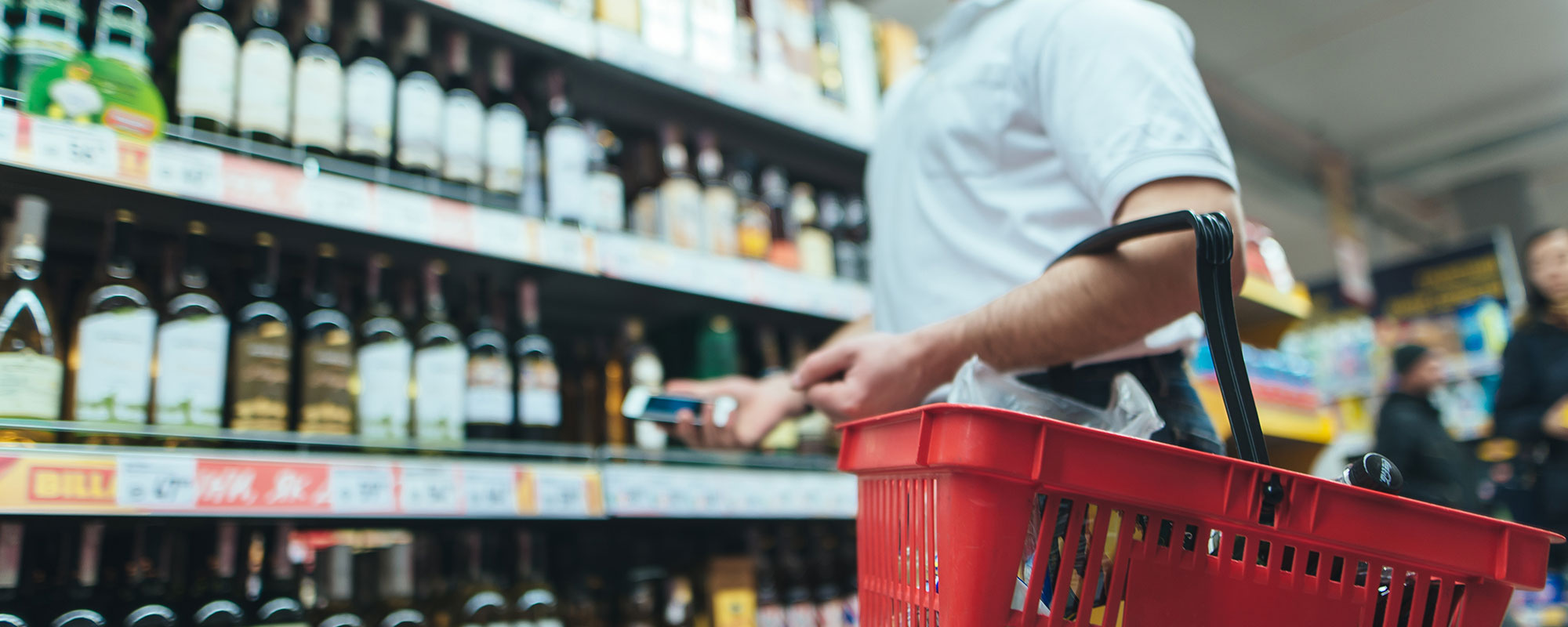 Person Shopping For Liquor Person Shopping For Liquor